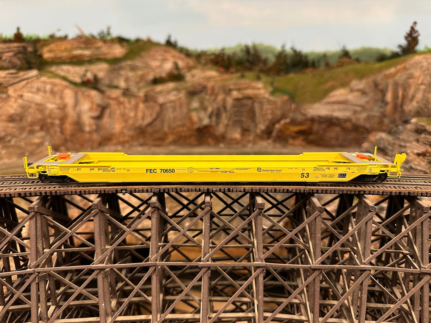 HO Scale TrentonWorks 53’ All-Purpose Well Car (As-built) - Florida East Coast (FEC) Yellow